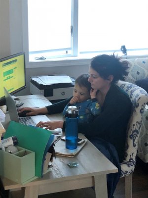 Pam working at home with her son